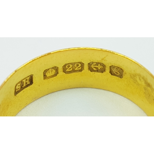 324 - A 22K GOLD BAND RING (6mm width) .       2.9gms     size J