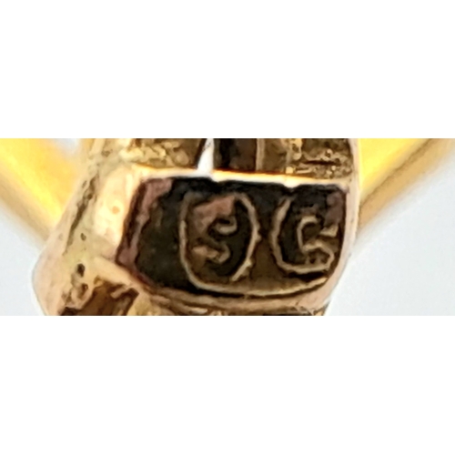 79 - AN ANTIQUE 9K GOLD AND AMETHYST BEETLE BROOCH .   4.2gms