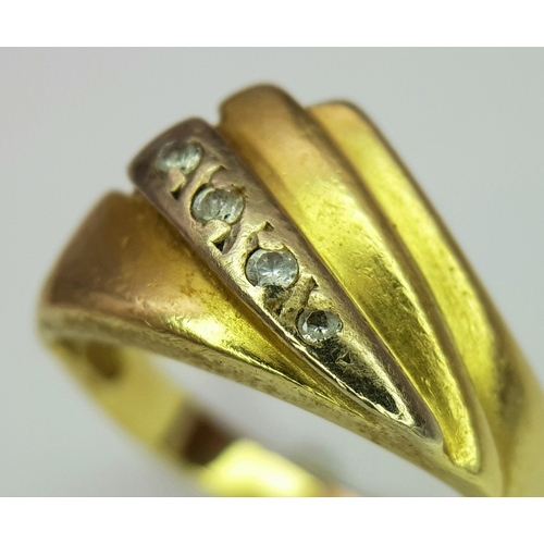 47 - An 18K Yellow Gold White Stone Swirl Ring. Size L. 4g.