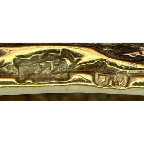 93 - A VINTAGE 9K GOLD HINGED BANGLE WITH DECORATIVE SIDES AND DIAMOND AND AMETHYST TOP STONES .    13.2g... 