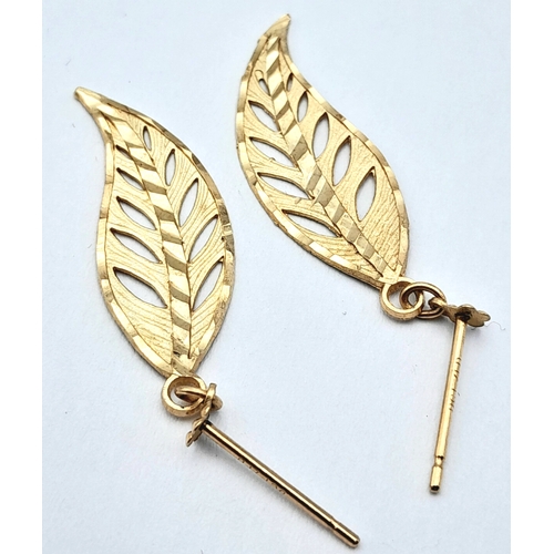 619 - A PAIR 9K GOLD EARRINGD IN LEAF FORM .    1.2gms