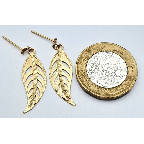 619 - A PAIR 9K GOLD EARRINGD IN LEAF FORM .    1.2gms