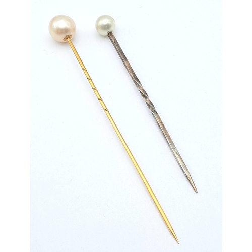 626 - 2 VINTAGE PEARL STICK PINS , 1 IN GOLD AND THE OTHER SILVER .