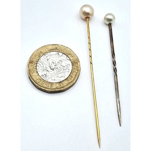 626 - 2 VINTAGE PEARL STICK PINS , 1 IN GOLD AND THE OTHER SILVER .