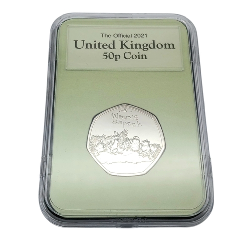 635 - Nine Winnie The Pooh Collectible 50 Pence Coins. All brilliant uncirculated and encapsulated.