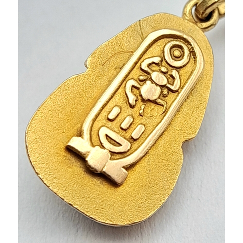 646 - A 14K GOLD CHARM BRACELET WITH 6 CHARMS .     21.9gms 
   19cms