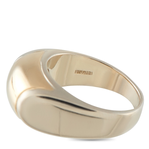 716 - A Bvlgari Tronchetto 18K Yellow Gold Ring. Crafted in 18K yellow gold, the band curves with a smooth... 