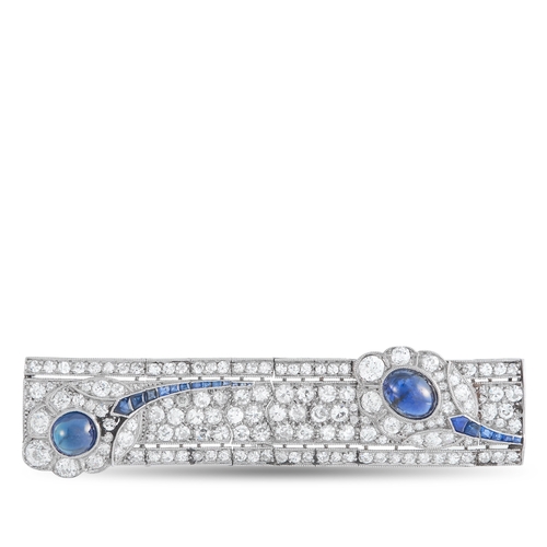 A Platinum 4.0ct Diamond and Sapphire Brooch. Diamonds with a total weight of 4.0 carats elevate the Platinum setting. Sapphire accents with a total weight of 5.0 carats. It measures 0.65inches long by 2.65inches wide. Good Condition and includes a gift box. Total weight: 18.1 grams. *This item is held at Cadmore USA Office in Pennsylvania, USA and will be shipped from there. Buyers will be responsible for direct shipping payments.*