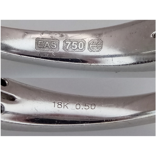 1175 - AN 18K WHITE GOLD, DIAMOND AND AQUAMARINE SET, SPLIT SHANK RING. 0.50 CTW OF DIAMONDS WITH A 2.00 CT... 