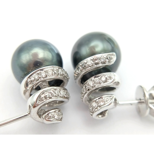 1244 - A PAIR OF 18K WHITE GOLD, DIAMOND AND PEARL, SPIRAL DESIGN, DROP EARRINGS. 4G. MS RED 1011