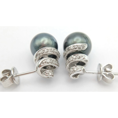 1244 - A PAIR OF 18K WHITE GOLD, DIAMOND AND PEARL, SPIRAL DESIGN, DROP EARRINGS. 4G. MS RED 1011