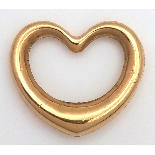612 - A 9K GOLD OPEN HEART PENDANT .    .5gm