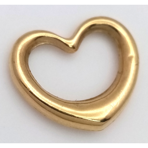 612 - A 9K GOLD OPEN HEART PENDANT .    .5gm