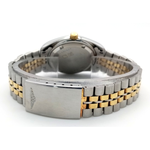 640 - A Stylish Longines Quartz Ladies Watch. Two tone stainless steel bracelet and case - 33mm. White dia... 