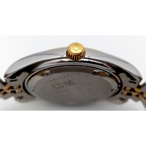 640 - A Stylish Longines Quartz Ladies Watch. Two tone stainless steel bracelet and case - 33mm. White dia... 