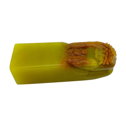711 - A Rare Miniature Jadeite Seal Carved with Maitreya (Laughing Buddha). Rectangular form, carved from ... 