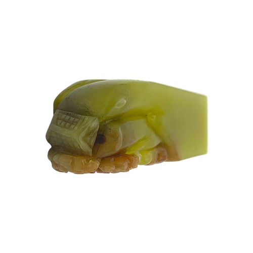 711 - A Rare Miniature Jadeite Seal Carved with Maitreya (Laughing Buddha). Rectangular form, carved from ... 