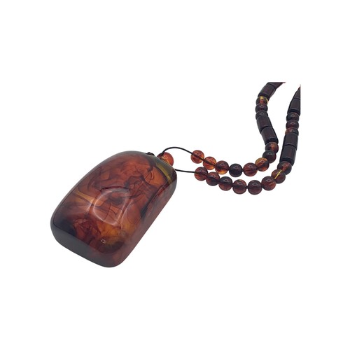 A Bodhi Seed Root Pendant Necklace. Pendant: approx. 5 × 3.5 cm ...
