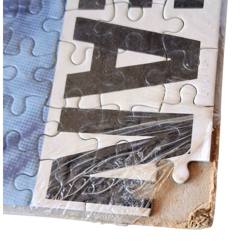 1172 - Two vintage James Dean jigsaw puzzles by Jigstars. Both in original cellophane but one has a corner ... 