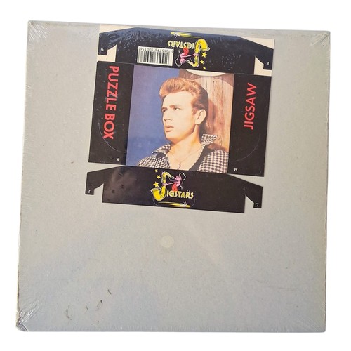 1172 - Two vintage James Dean jigsaw puzzles by Jigstars. Both in original cellophane but one has a corner ... 