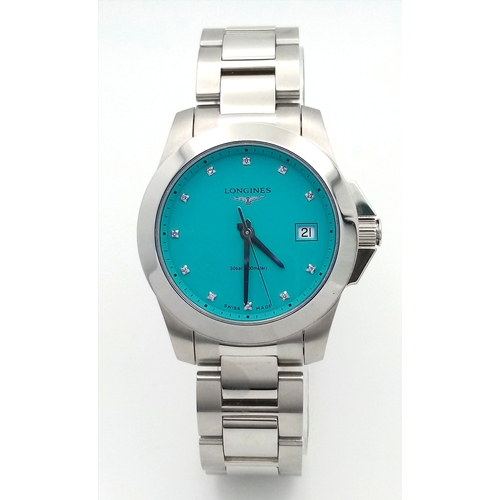 668 - A Longines Conquest Quartz Ladies Watch. Stainless steel bracelet and case - 34mm. Tiffany blue dial... 