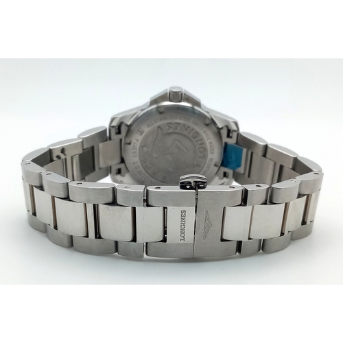 668 - A Longines Conquest Quartz Ladies Watch. Stainless steel bracelet and case - 34mm. Tiffany blue dial... 