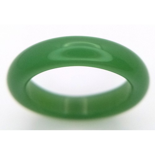 664 - A Jade Band Ring Size O. Measures 5mm Band Width and weighs 1.9 Grams