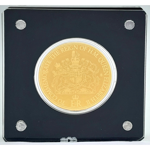 1142 - A Commemorative 'Queen Elizabeth II' Gold Coin Card. 1/200th oz of fine gold (.999). Comes with COA ... 