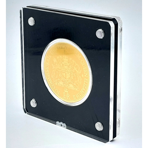 1142 - A Commemorative 'Queen Elizabeth II' Gold Coin Card. 1/200th oz of fine gold (.999). Comes with COA ... 