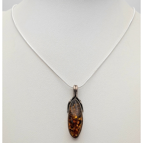 1160 - Genuine AMBER PENDANT set in SILVER and Mounted on a SILVER NECKLACE. Necklace x 48 cm. Pendant x 3.... 