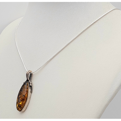 1160 - Genuine AMBER PENDANT set in SILVER and Mounted on a SILVER NECKLACE. Necklace x 48 cm. Pendant x 3.... 
