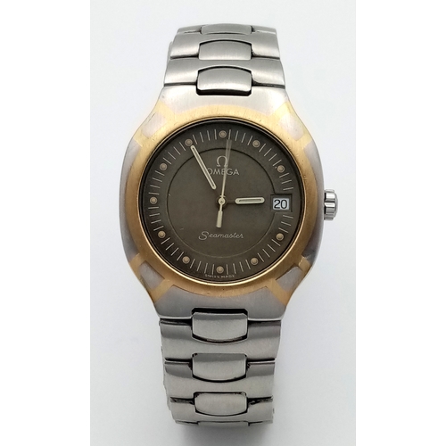 1185 - A Vintage Omega Seamaster Polaris Quartz Watch. Stainless steel bracelet and case with gold inlay. C... 