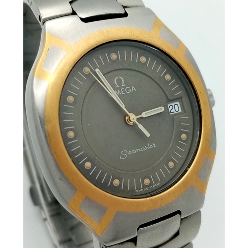 1185 - A Vintage Omega Seamaster Polaris Quartz Watch. Stainless steel bracelet and case with gold inlay. C... 