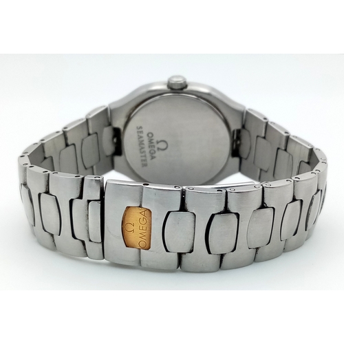 1185 - A Vintage Omega Seamaster Polaris Quartz Watch. Stainless steel bracelet and case with gold inlay. C... 