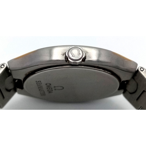 1185 - A Vintage Omega Seamaster Polaris Quartz Watch. Stainless steel bracelet and case with gold inlay. C... 