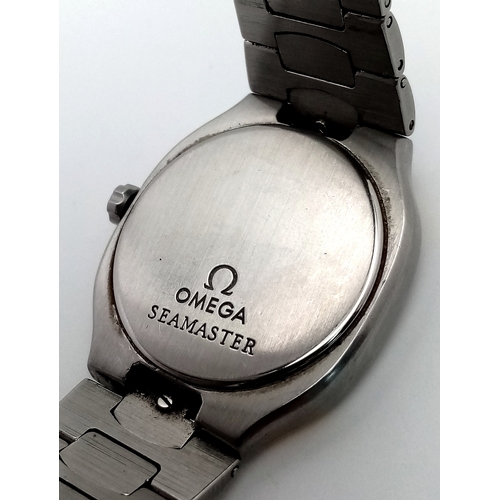 1185 - A Vintage Omega Seamaster Polaris Quartz Watch. Stainless steel bracelet and case with gold inlay. C... 