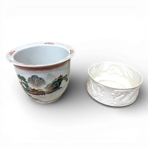 1247 - A pair of Chinese antique ceramic bowls, comprising one hand-painted landscape bowl and one white re... 