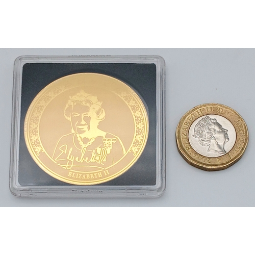1156 - A Commemorative 'Elizabeth II' Gold Coin Card. 1/200th oz of fine gold (.999). Comes with COA and wa... 