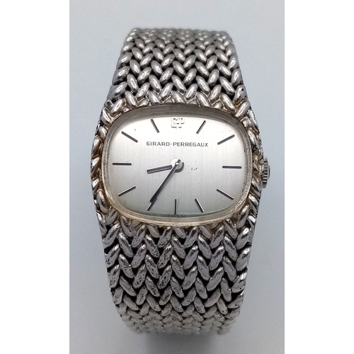 1197 - A Vintage Girard-Perregaux Mechanical Ladies Watch. Stainless steel mesh bracelet and integrated cas... 