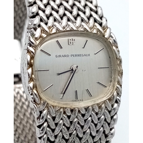 1197 - A Vintage Girard-Perregaux Mechanical Ladies Watch. Stainless steel mesh bracelet and integrated cas... 