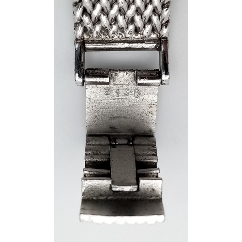 1197 - A Vintage Girard-Perregaux Mechanical Ladies Watch. Stainless steel mesh bracelet and integrated cas... 