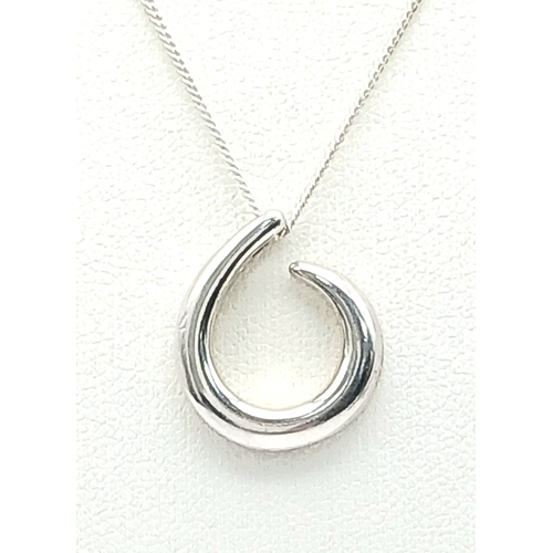 1249 - A Sterling Silver Eternal Circle Pendant Necklace. Both Pendant and Necklace are Hallmarked 925. App... 