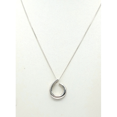 1249 - A Sterling Silver Eternal Circle Pendant Necklace. Both Pendant and Necklace are Hallmarked 925. App... 