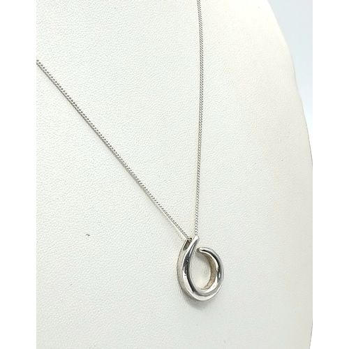 1249 - A Sterling Silver Eternal Circle Pendant Necklace. Both Pendant and Necklace are Hallmarked 925. App... 