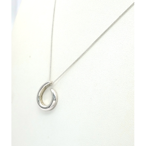 1249 - A Sterling Silver Eternal Circle Pendant Necklace. Both Pendant and Necklace are Hallmarked 925. App... 