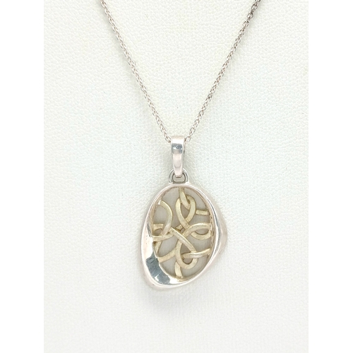 1270 - A Sterling Silver Celtic Knot Pendant Necklace. Pendant Hallmarked 925 and Necklace Hallmarked STERL... 