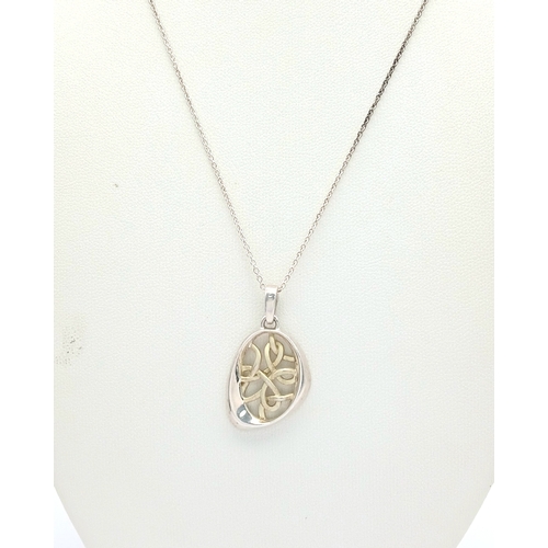 1270 - A Sterling Silver Celtic Knot Pendant Necklace. Pendant Hallmarked 925 and Necklace Hallmarked STERL... 