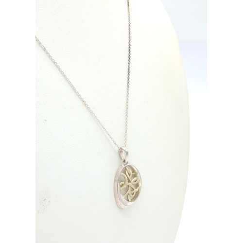 1270 - A Sterling Silver Celtic Knot Pendant Necklace. Pendant Hallmarked 925 and Necklace Hallmarked STERL... 