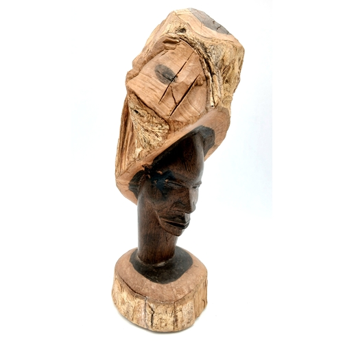 1173 - A vintage hand-carved Tribal wooden sculpture from a solid wood trunk. Height 28cm. Please see photo... 