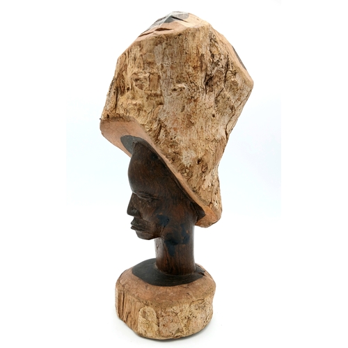 1173 - A vintage hand-carved Tribal wooden sculpture from a solid wood trunk. Height 28cm. Please see photo... 